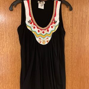Sleeveless top with embellishments